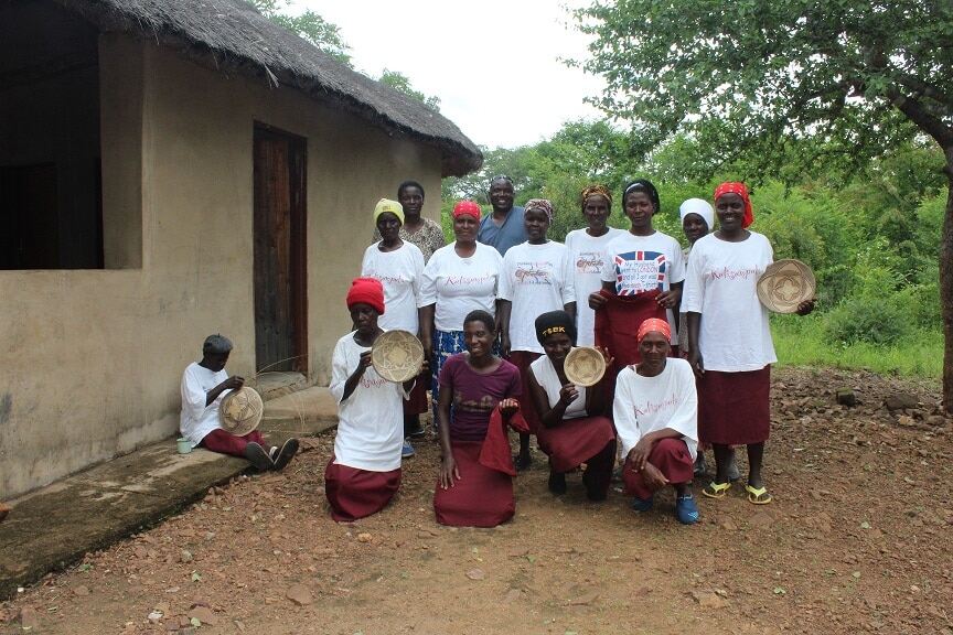 A group presenting their handmade sewing products.